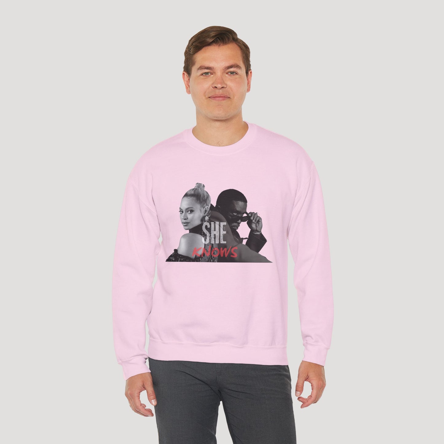 'She Knows' - Unisex Heavy Blend Crewneck Sweatshirt