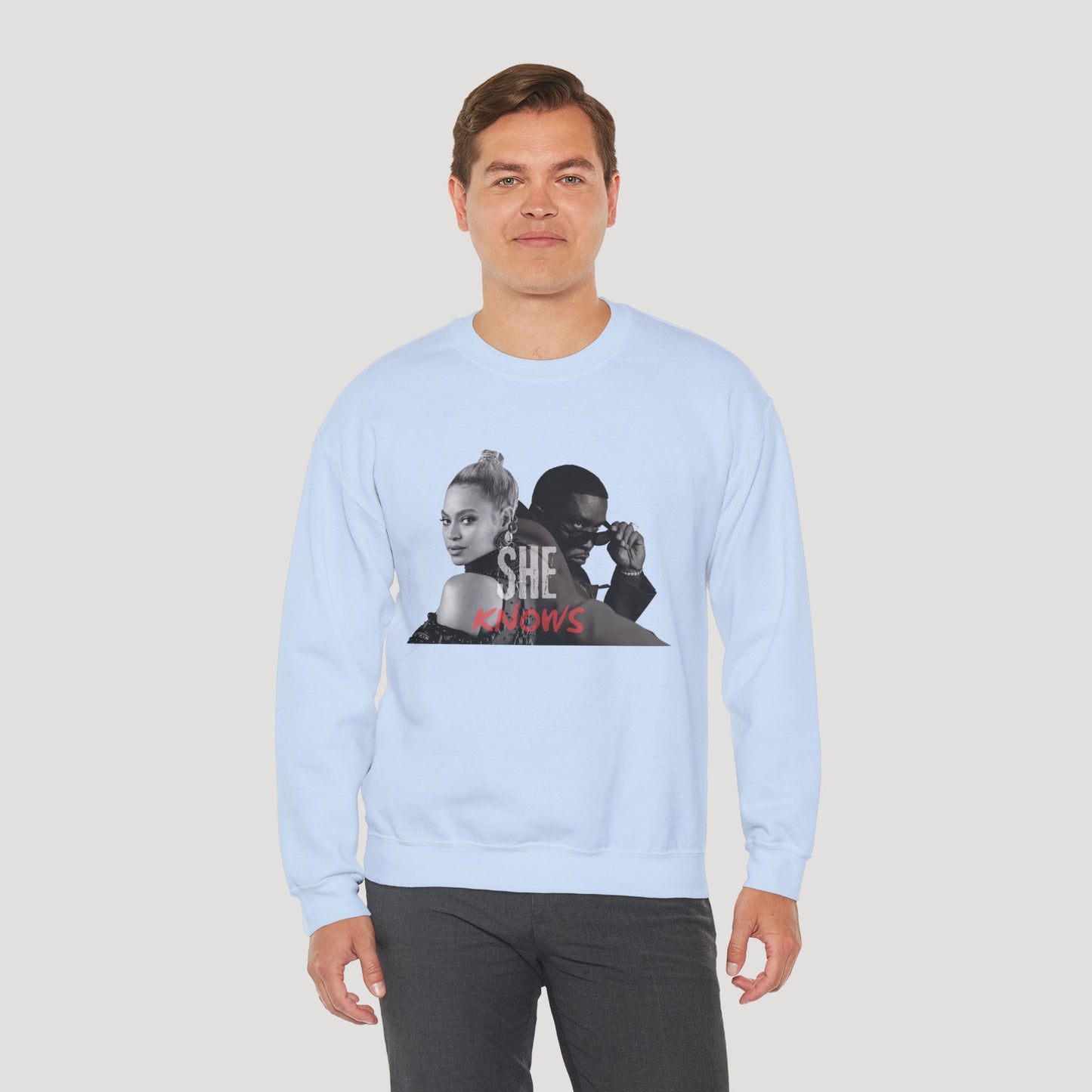 'She Knows' - Unisex Heavy Blend Crewneck Sweatshirt