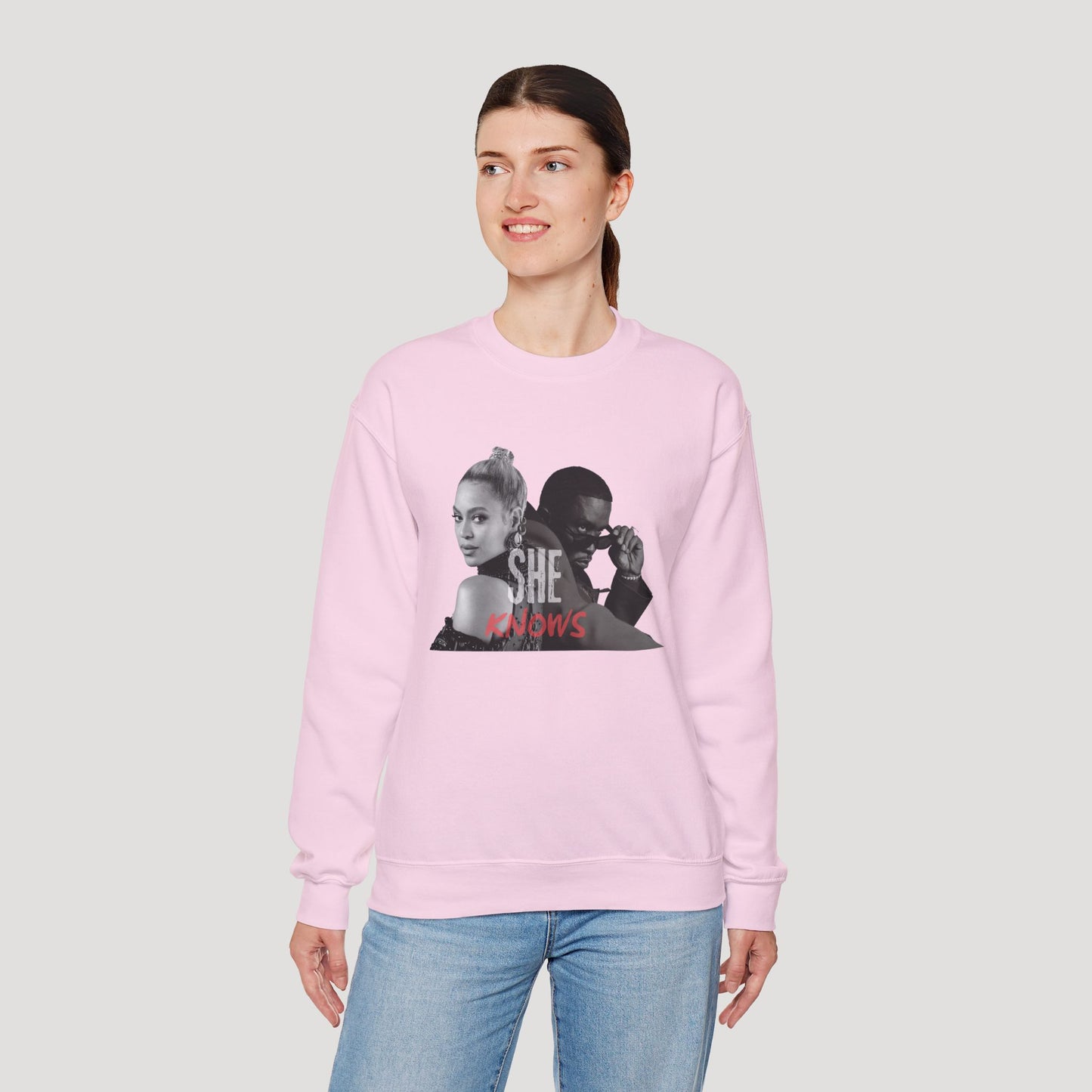 'She Knows' - Unisex Heavy Blend Crewneck Sweatshirt