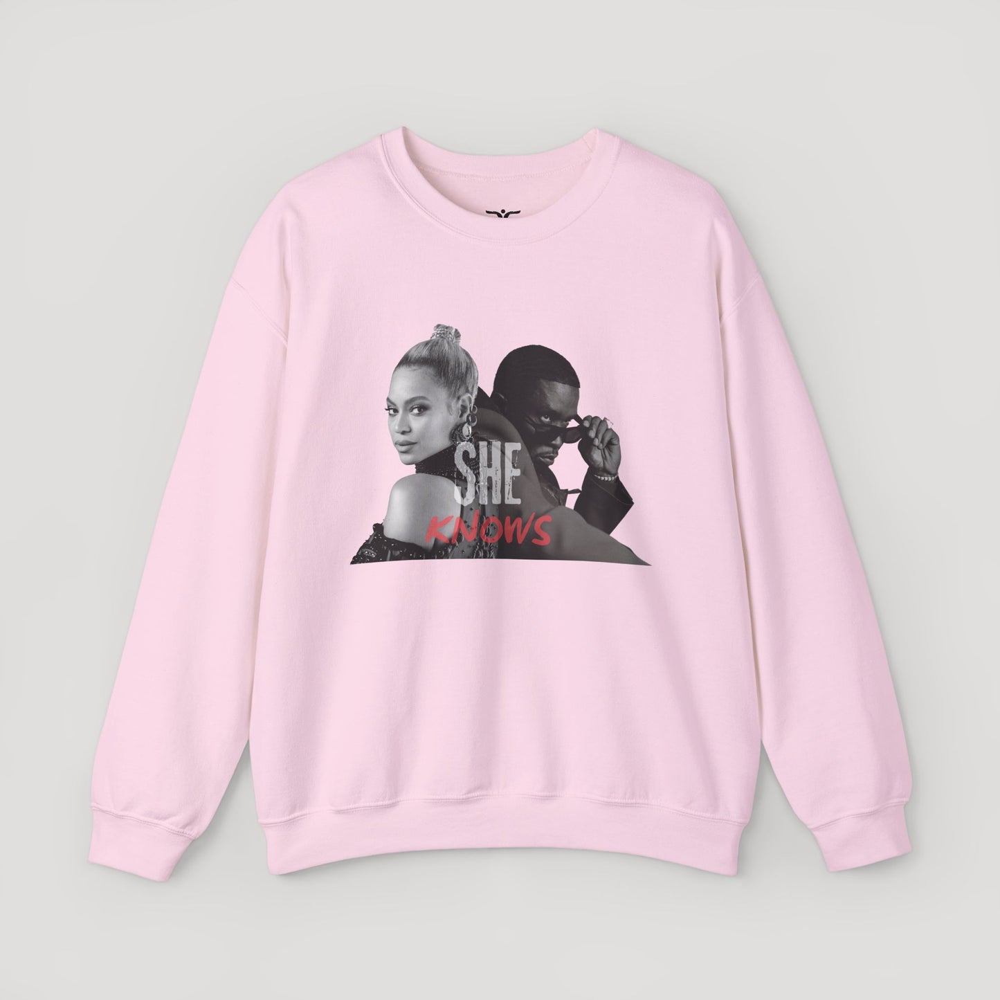 'She Knows' - Unisex Heavy Blend Crewneck Sweatshirt