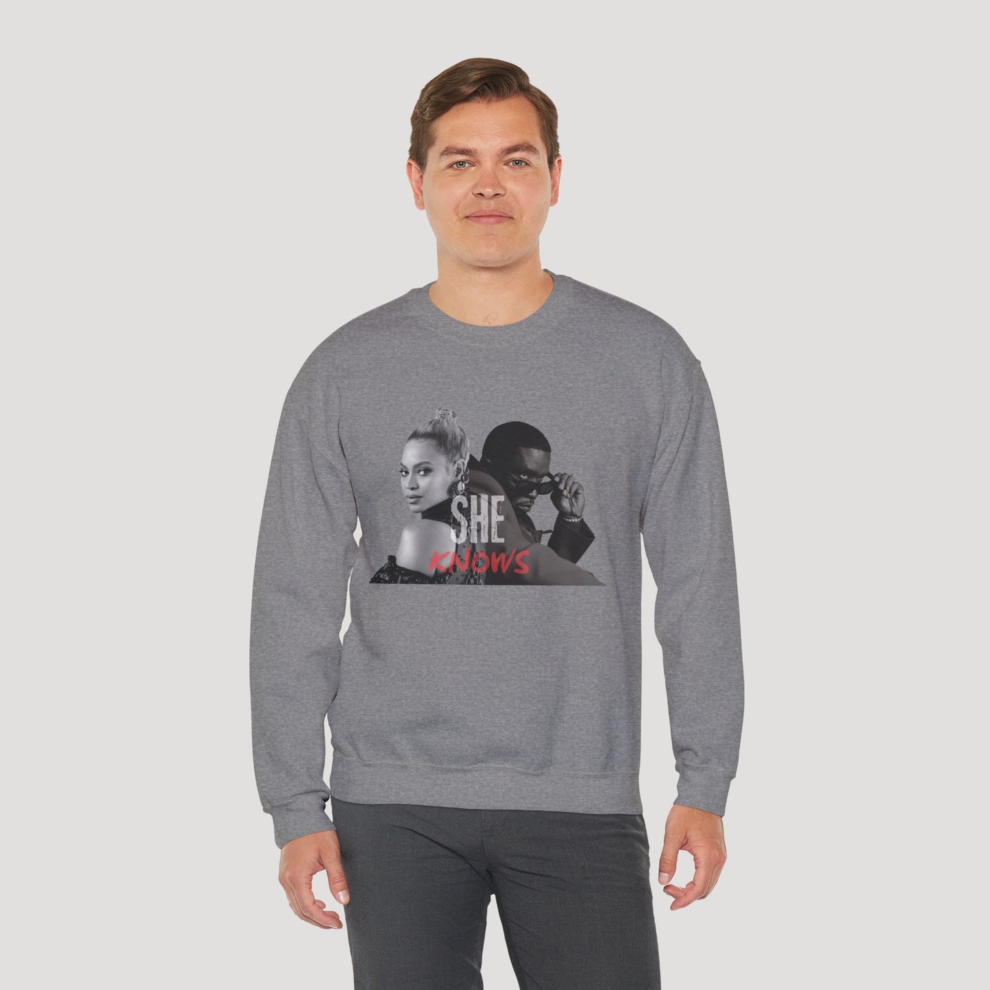 'She Knows' - Unisex Heavy Blend Crewneck Sweatshirt