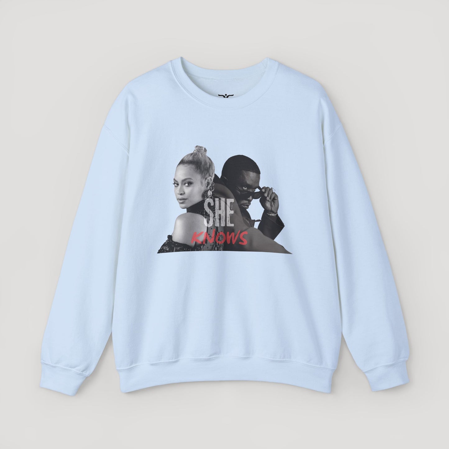 'She Knows' - Unisex Heavy Blend Crewneck Sweatshirt